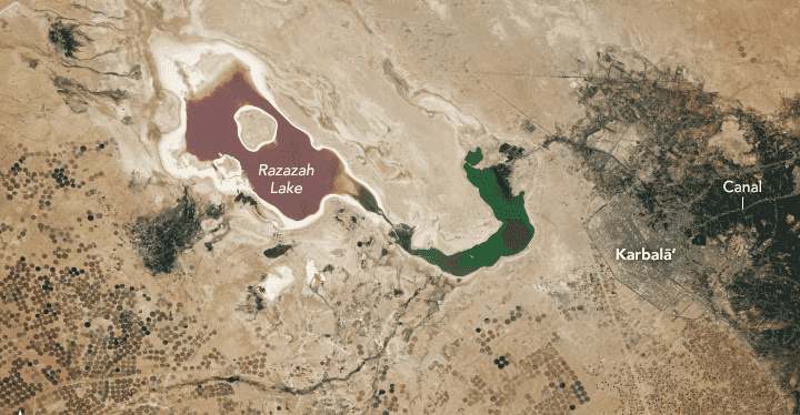 الرزازة حمراء وخضراء.. صورة من الفضاء لبحيرة الملح في العراق
