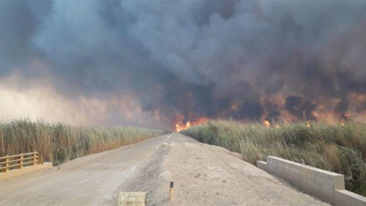 استمرار حرائق "هور الحويزة" في ميسان