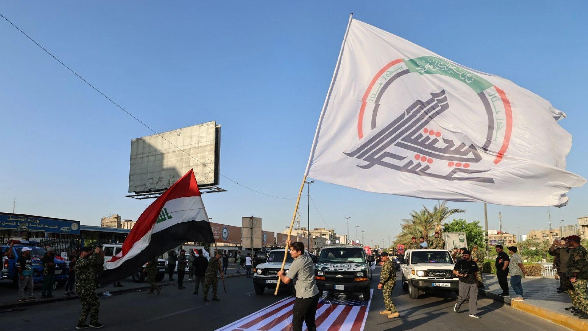 بەهۆی سوكایەتیكردن بەئاڵای ئەمریكا چوار ئەفسەری عیراق لە کارەکانیان دوورخرانەوە